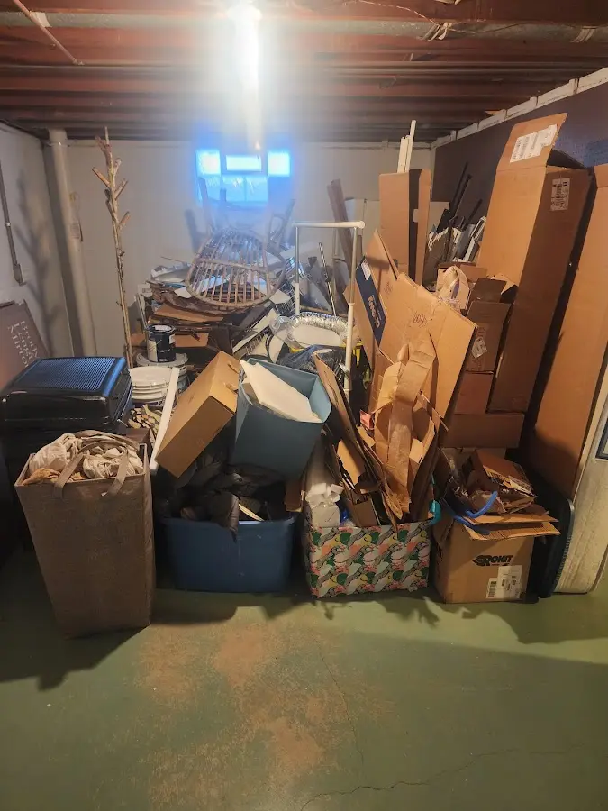 Roll-off dumpster container at job site for 6 Yard Dumpster Rental in Port Vue